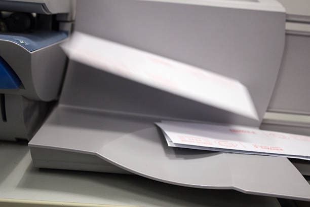 Letters exiting a franking machine