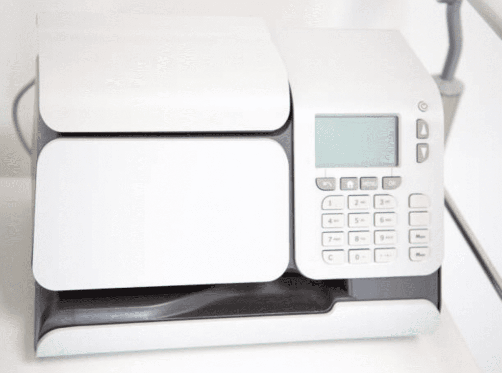 Machine for weighing and franking mail machine