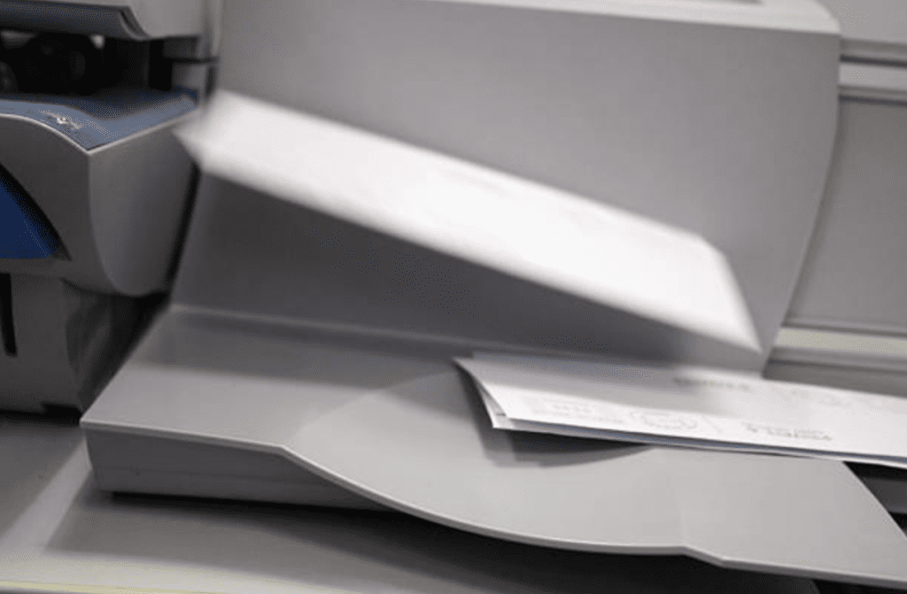 Franking Machine Letters exiting a franking machine