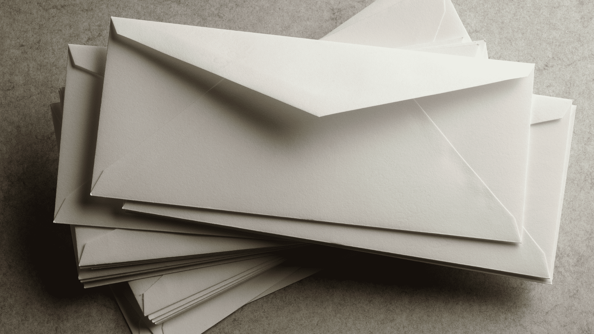 Small stack of unsealed envelopes