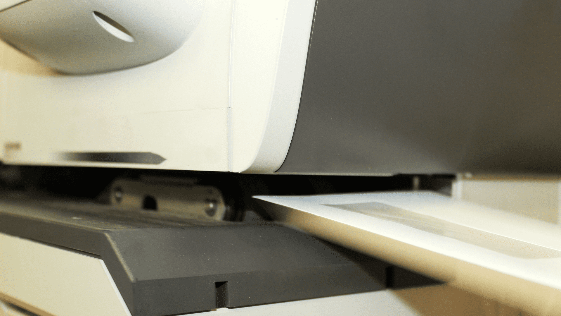 Franking letter machine pushing out paper